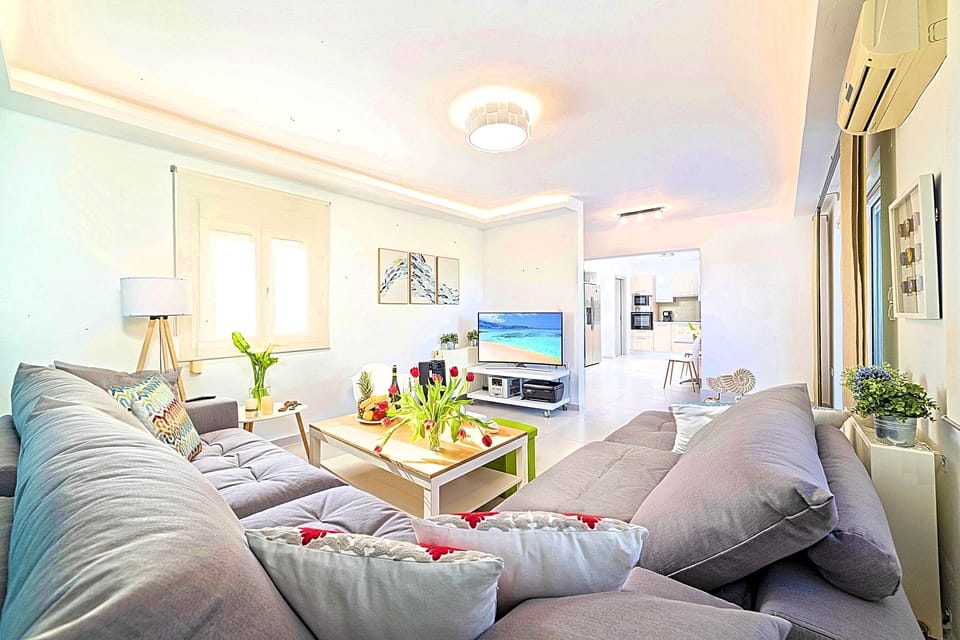 Villa | Living area | 42-inch flat-screen TV with satellite channels, plasma TV, DVD player
