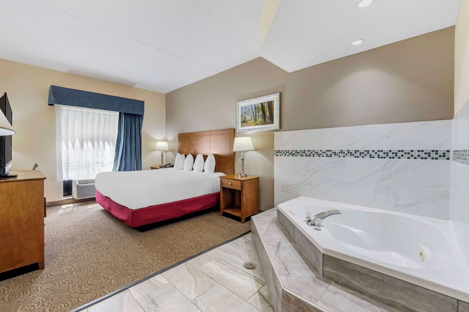 Suite, 1 King Bed, Non Smoking, Jetted Tub | Pillowtop beds, iron/ironing board, cribs/infant beds, WiFi