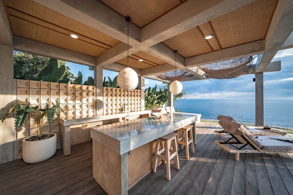 Deluxe Villa, 2 Bedrooms, Patio, Sea View | Living area | 40-inch TV with cable channels