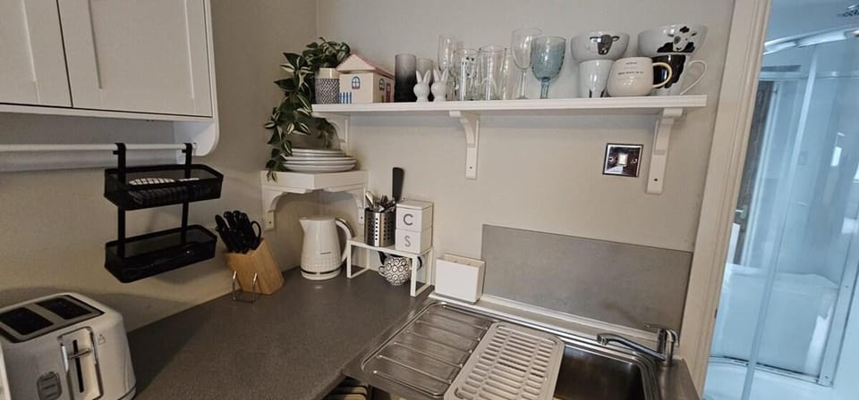Fridge, microwave, electric kettle, toaster