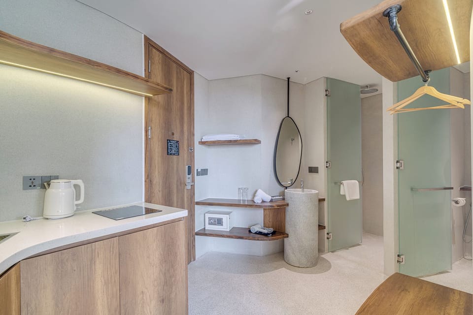 Deluxe Double Room, Kitchenette, City View | Private kitchen | Fridge, stovetop, rice cooker, cookware/dishes/utensils