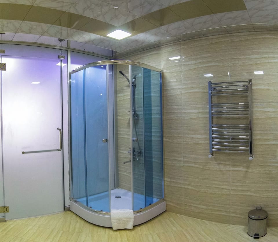 Suite, City View | Bathroom | Shower, free toiletries, hair dryer, slippers