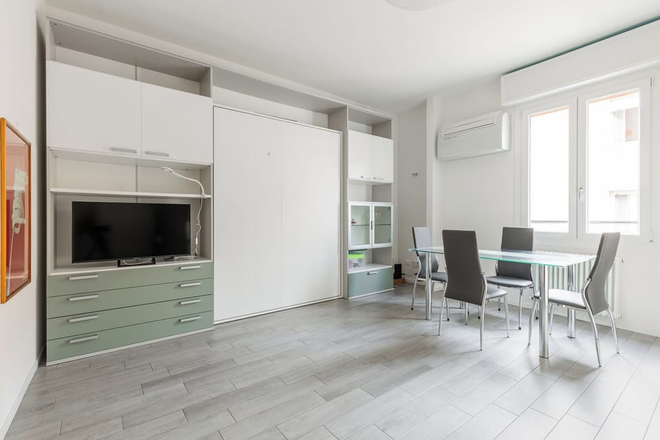 Studio | Living area | 30-inch TV with satellite channels