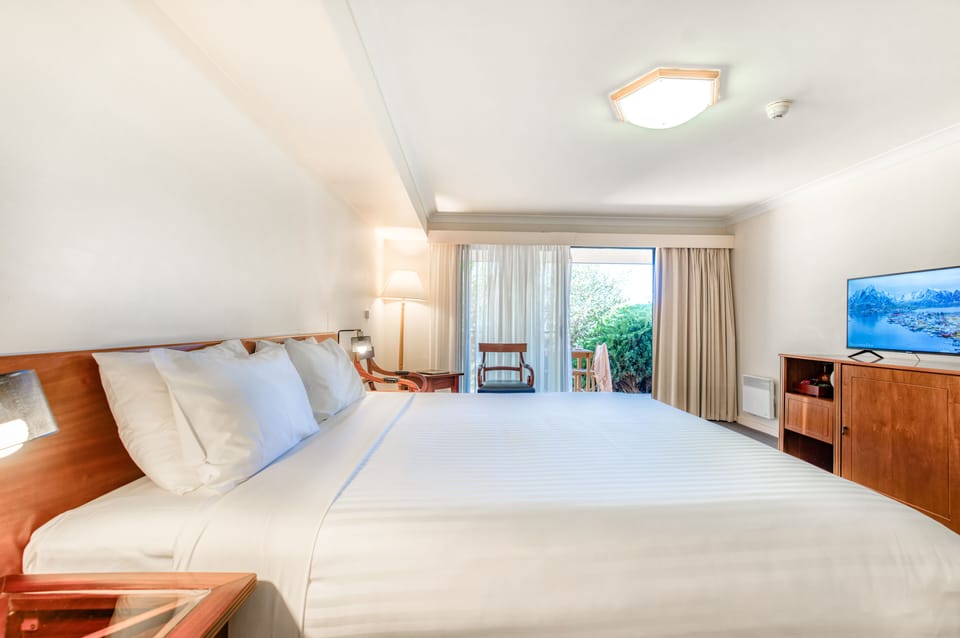 Garden View King Room | Premium bedding, in-room safe, individually furnished, desk