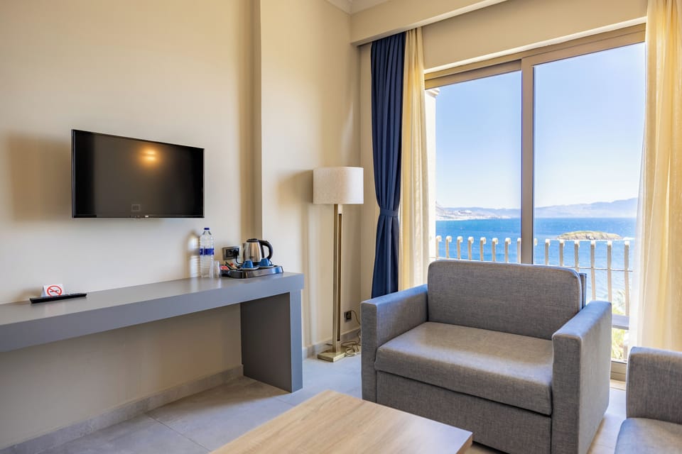 Superior Suite, Balcony | Living area | LCD TV