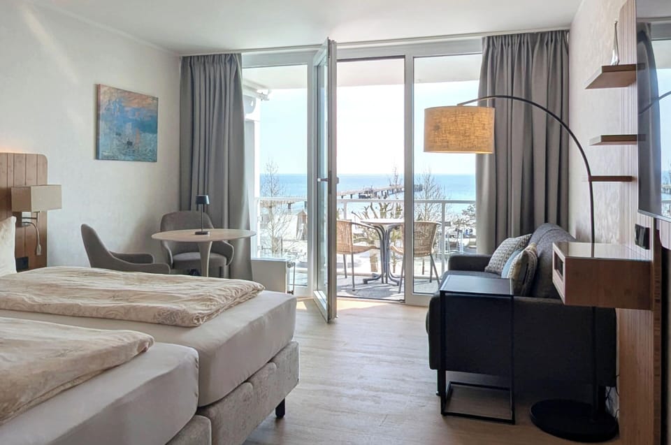 Deluxe Double Room, Sea View | Hypo-allergenic bedding available, minibar, in-room safe