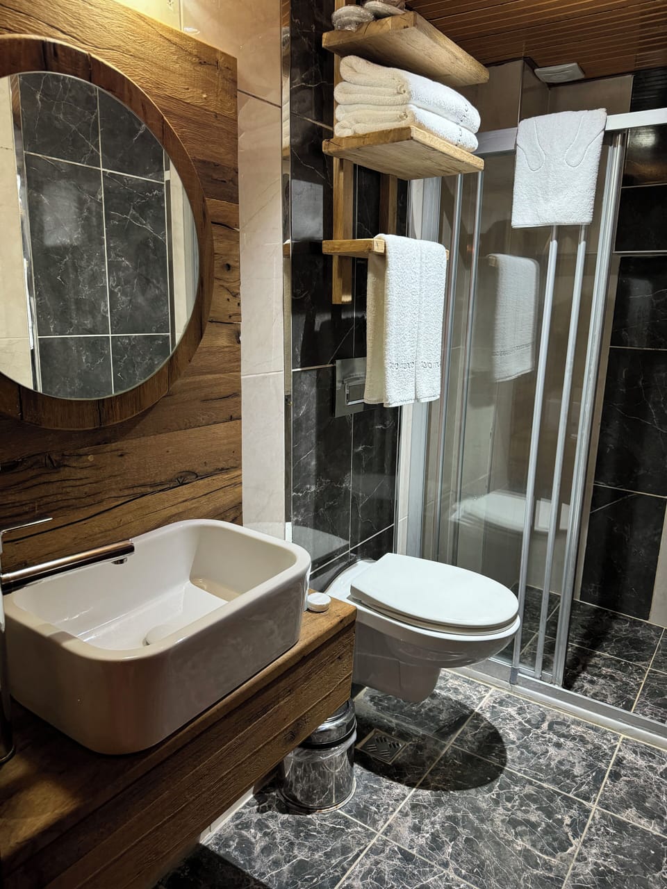 Shower, free toiletries, hair dryer, slippers