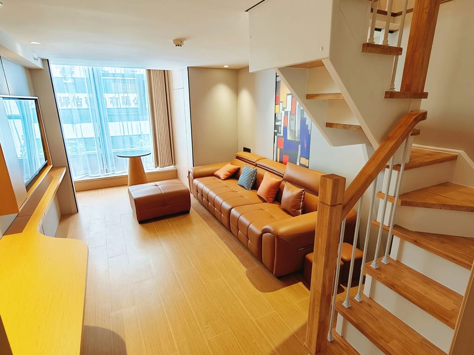 Superior Duplex | Living area | 55-inch LCD TV with cable channels