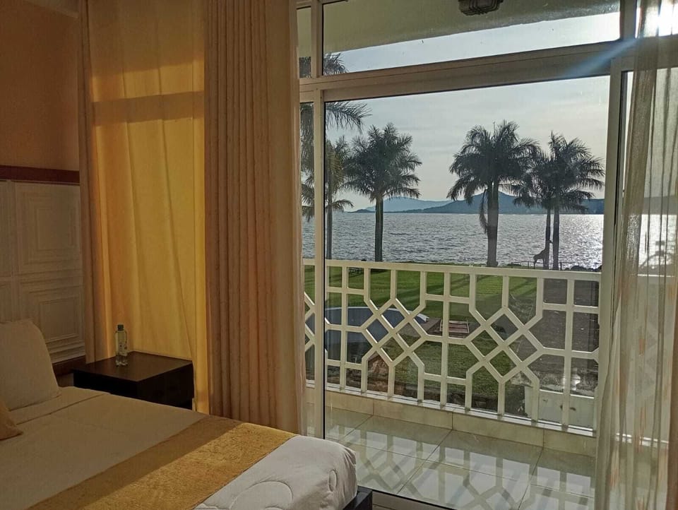 Deluxe Double Room, Lake View | Blackout drapes, iron/ironing board, free WiFi