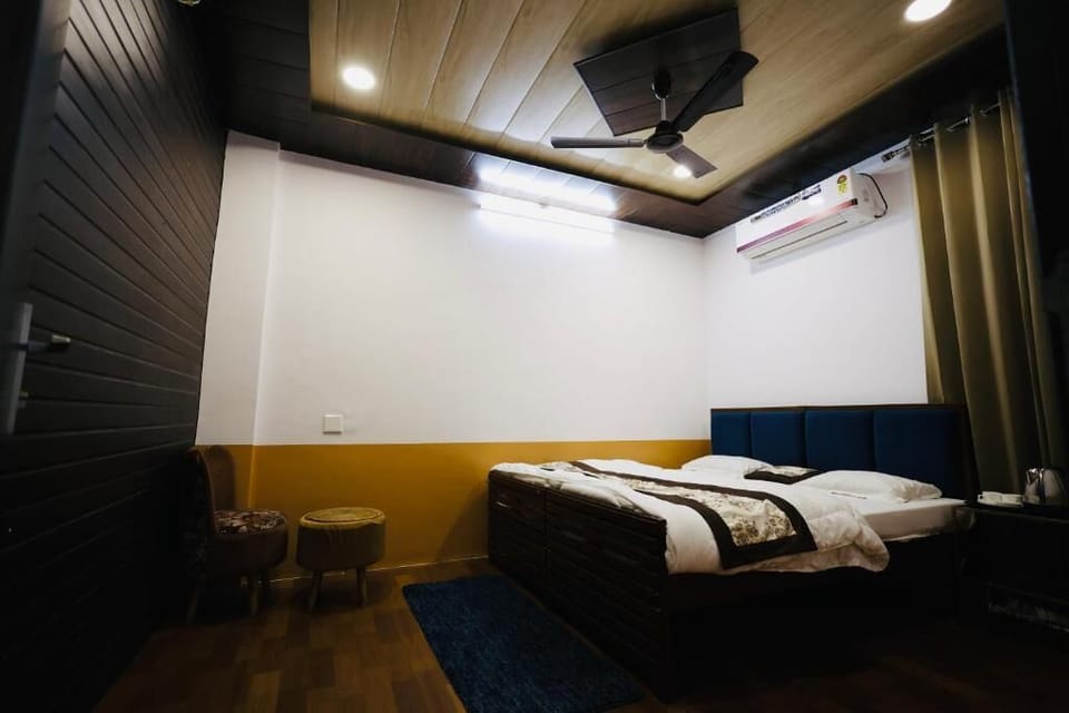 Deluxe Double Room, Balcony, City View | Blackout drapes, soundproofing, iron/ironing board, free WiFi