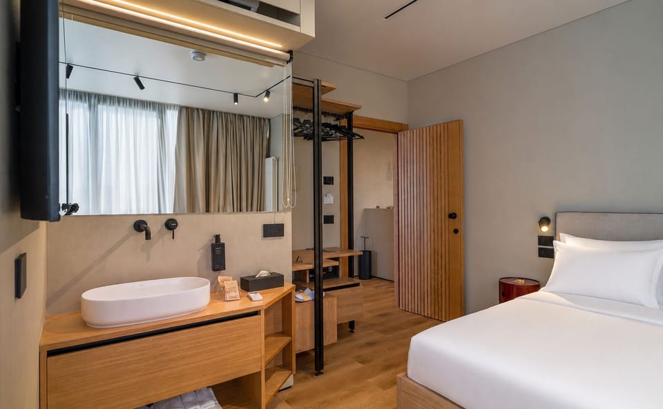 Superior Room, City View | Premium bedding, down comforters, minibar, in-room safe