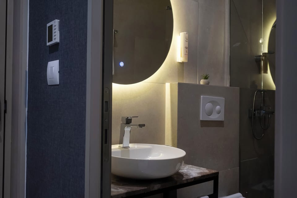 Standard Double or Twin Room | Bathroom | Shower, hair dryer, slippers, bidet