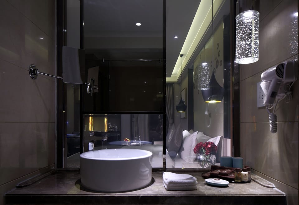 Shower, free toiletries, hair dryer, slippers