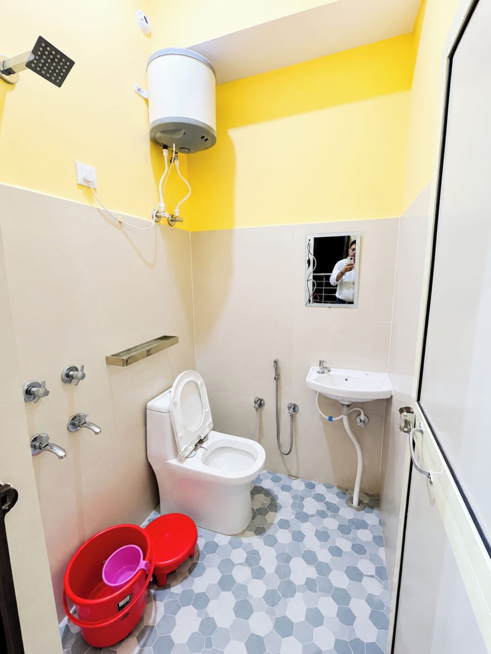 Shower, rainfall showerhead, slippers, towels