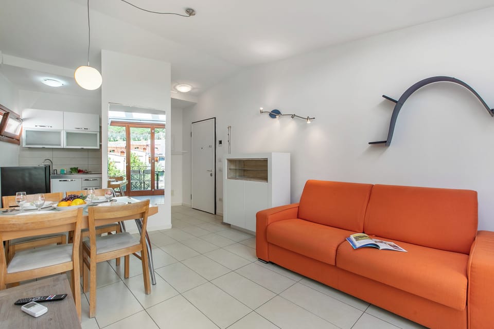 Family Apartment, Multiple Bedrooms (Garda Therme Apartment) | Living area | Flat-screen TV
