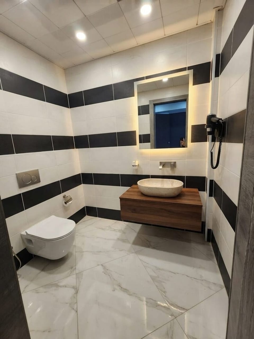Shower, free toiletries, hair dryer, slippers