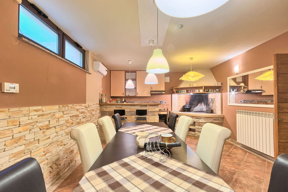 Villa | Private kitchen | Fridge, microwave, oven, stovetop