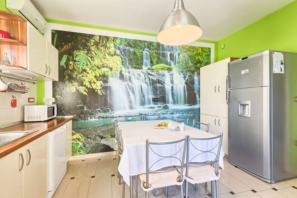 Villa | Private kitchen | Fridge, microwave, oven, stovetop
