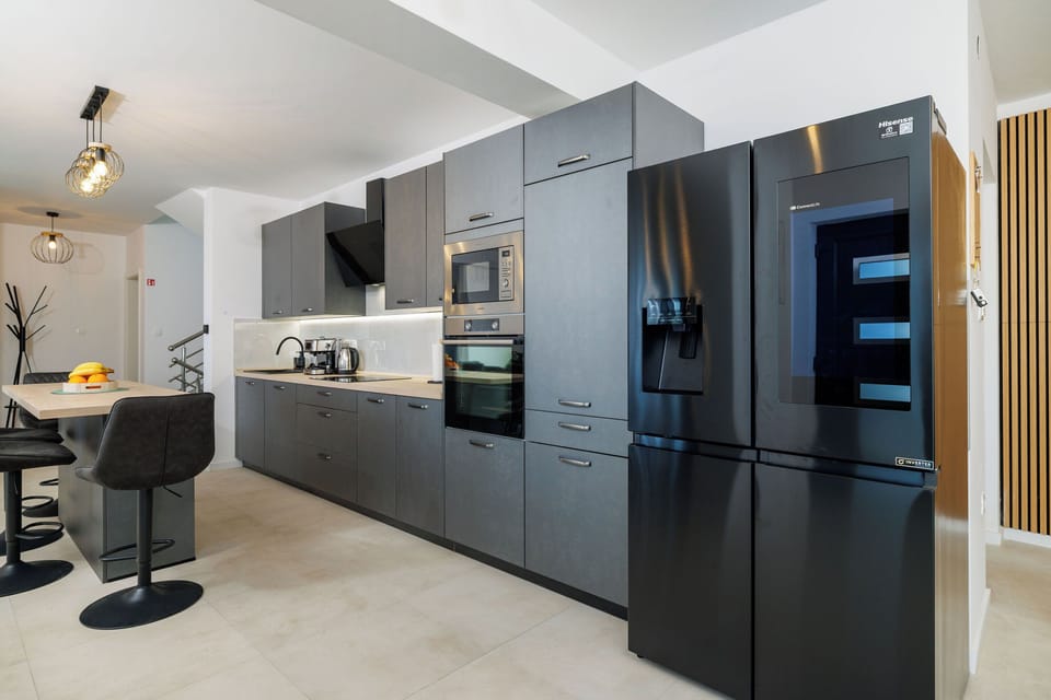 Villa | Private kitchen | Fridge, microwave, oven, stovetop