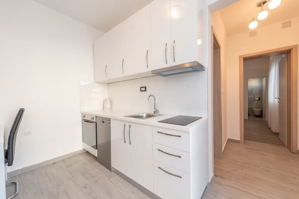 Villa | Private kitchen | Fridge, microwave, oven, stovetop