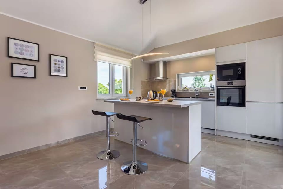 Villa | Private kitchen | Espresso maker, microwave, oven, stovetop