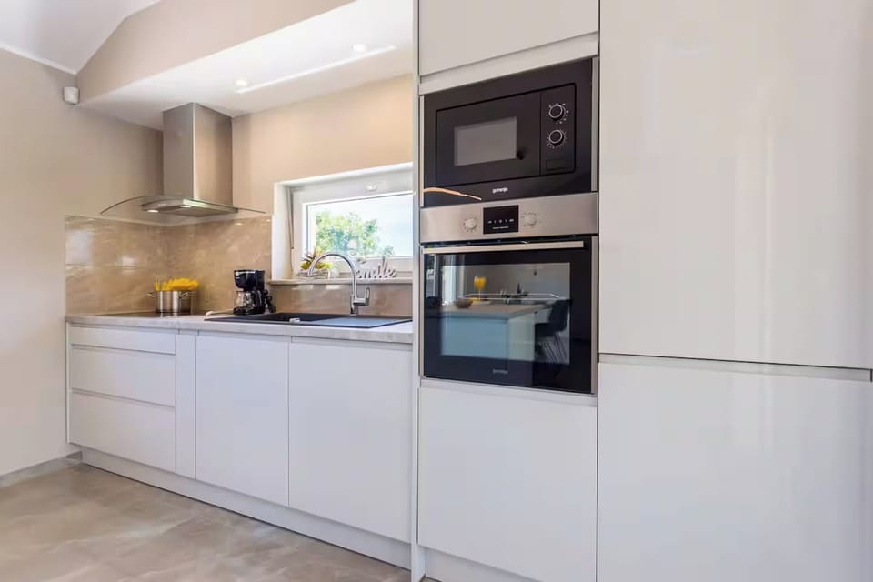 Villa | Private kitchen | Espresso maker, microwave, oven, stovetop