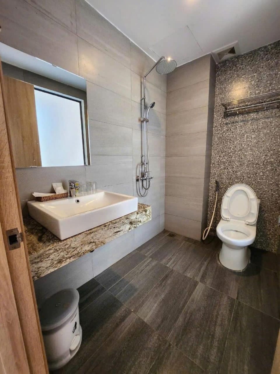 Quadruple Room | Bathroom | Shower, hair dryer, slippers, towels
