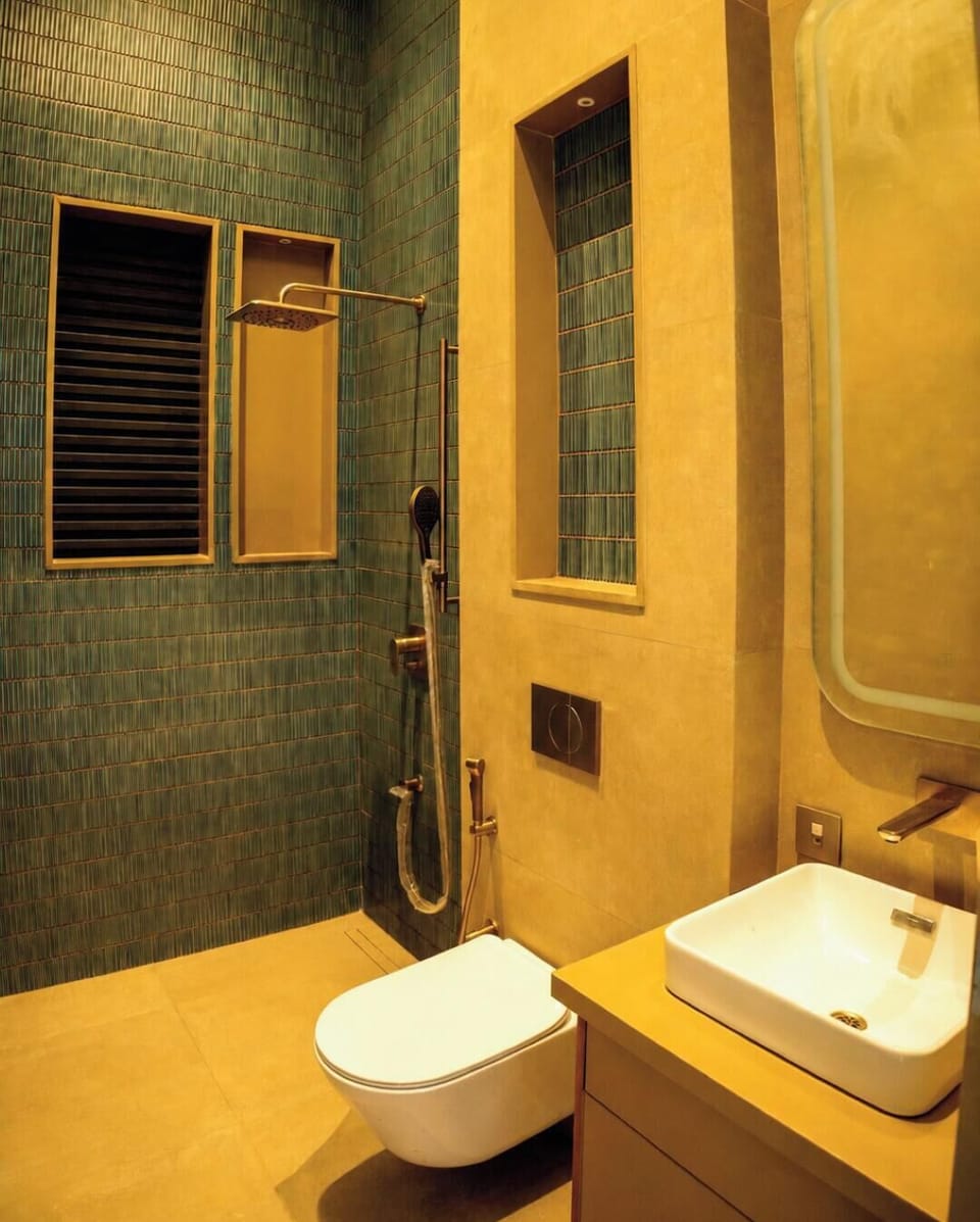 Executive Cottage, Pool View | Bathroom | Shower, slippers, towels, soap