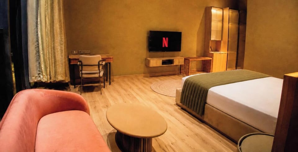 Executive Cottage, Pool View | In-room safe, blackout drapes, soundproofing, iron/ironing board