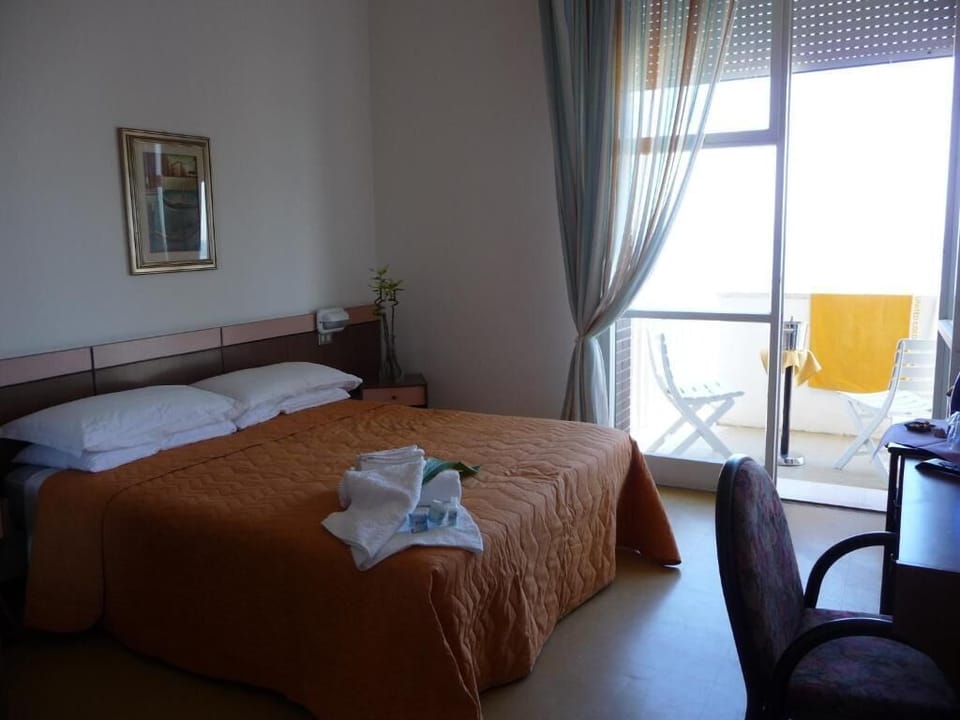Standard Quadruple Room, Balcony, City View | In-room safe, desk, blackout drapes, iron/ironing board (on request)
