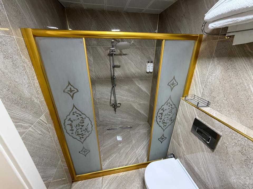 Family Quadruple Room, City View | Bathroom | Free toiletries, hair dryer, towels, soap