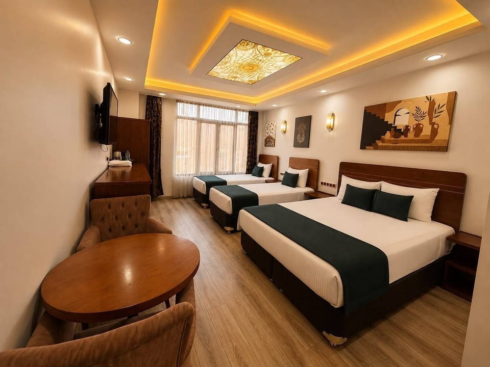 Family Quadruple Room, City View | WiFi (free), bed sheets