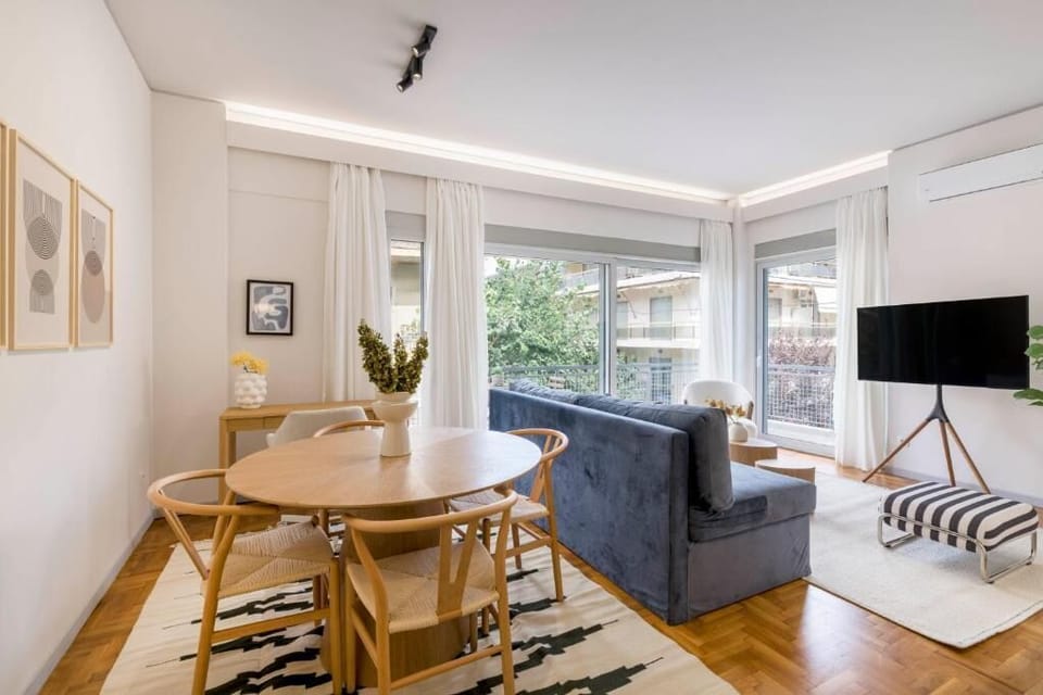 Comfort Apartment, Balcony, City View | Living area | 55-inch Smart TV with digital channels