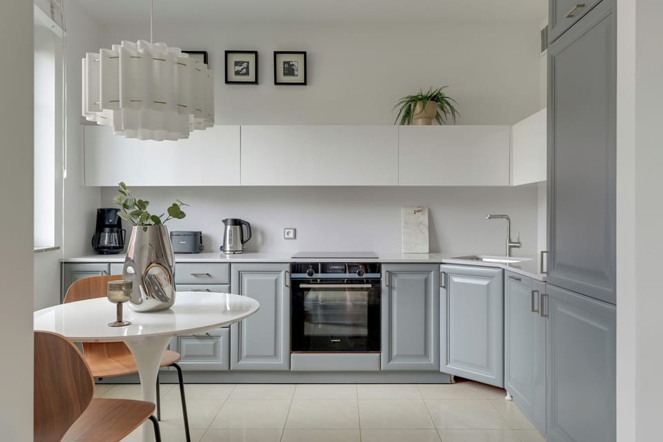 Family Apartment, Balcony, Courtyard View | Private kitchen | Coffee/tea maker, electric kettle, highchair, griddle
