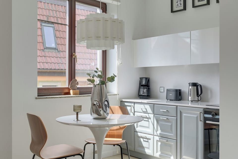Family Apartment, Balcony, Courtyard View | Private kitchen | Coffee/tea maker, electric kettle, highchair, griddle