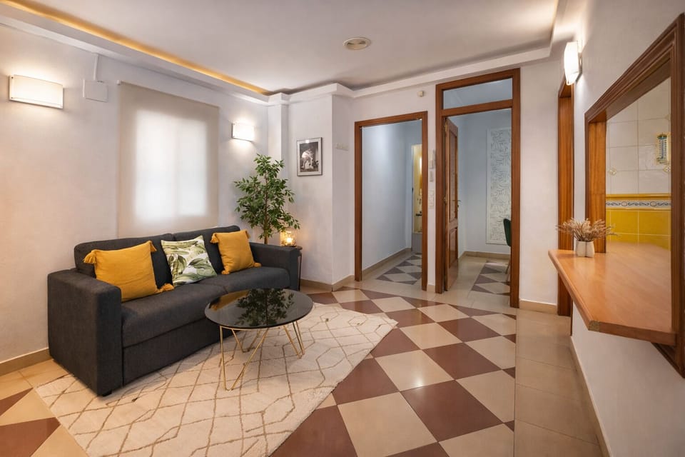 Classic Apartment | Living area | 32-inch flat-screen TV with cable channels