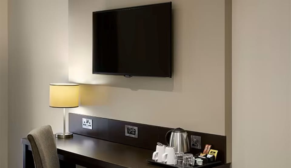 Desk, blackout drapes, iron/ironing board (on request), WiFi (free)