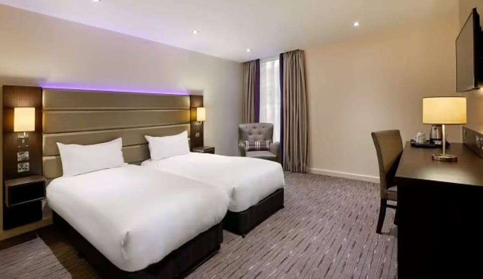 Standard Twin Room | Desk, blackout drapes, iron/ironing board (on request), WiFi (free)