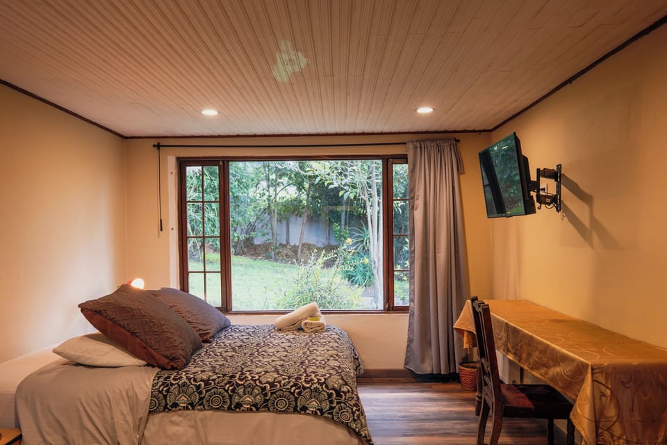 Deluxe House, Patio, Garden View | Desk, laptop workspace, free WiFi