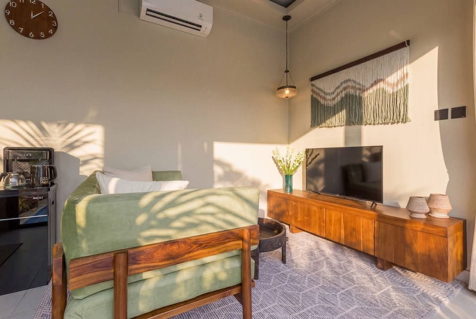 Romantic Villa, 2 Bedrooms, Private Pool | Living area | 50-inch Smart TV with digital channels