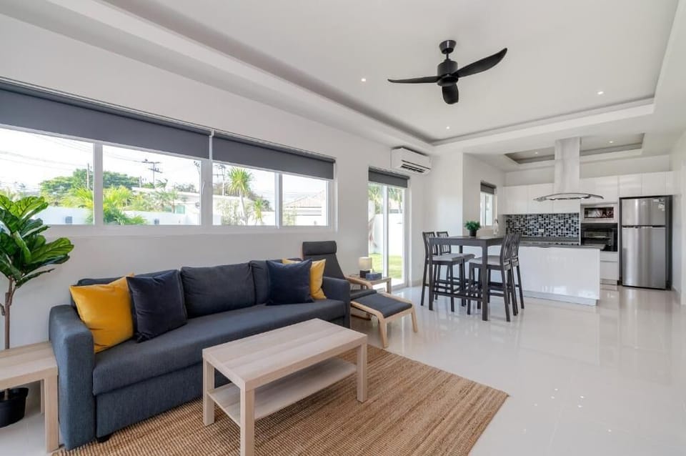 Deluxe Villa, Patio, Garden View | Living area | Flat-screen TV