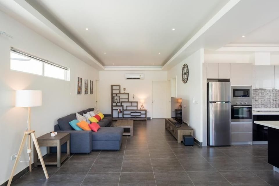 Villa, Garden View | Living area | Flat-screen TV