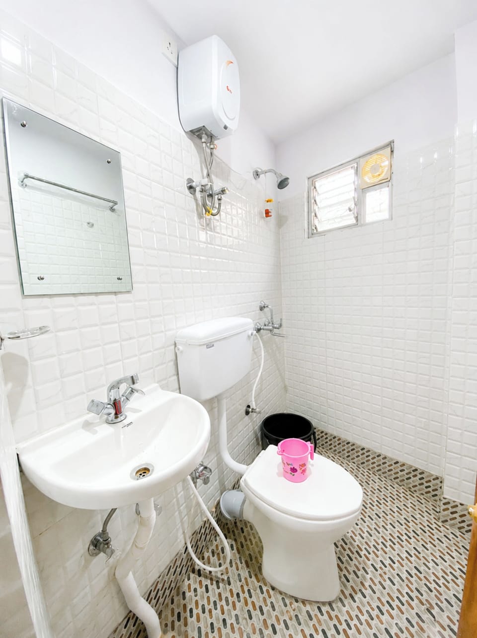 Shower, rainfall showerhead, slippers, towels