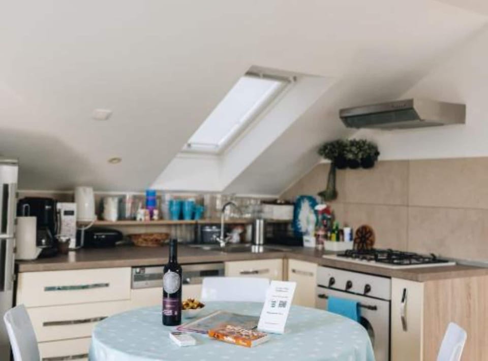 Apartment (Two Bedroom Apartment with Sea View a) | Private kitchen | Fridge, toaster