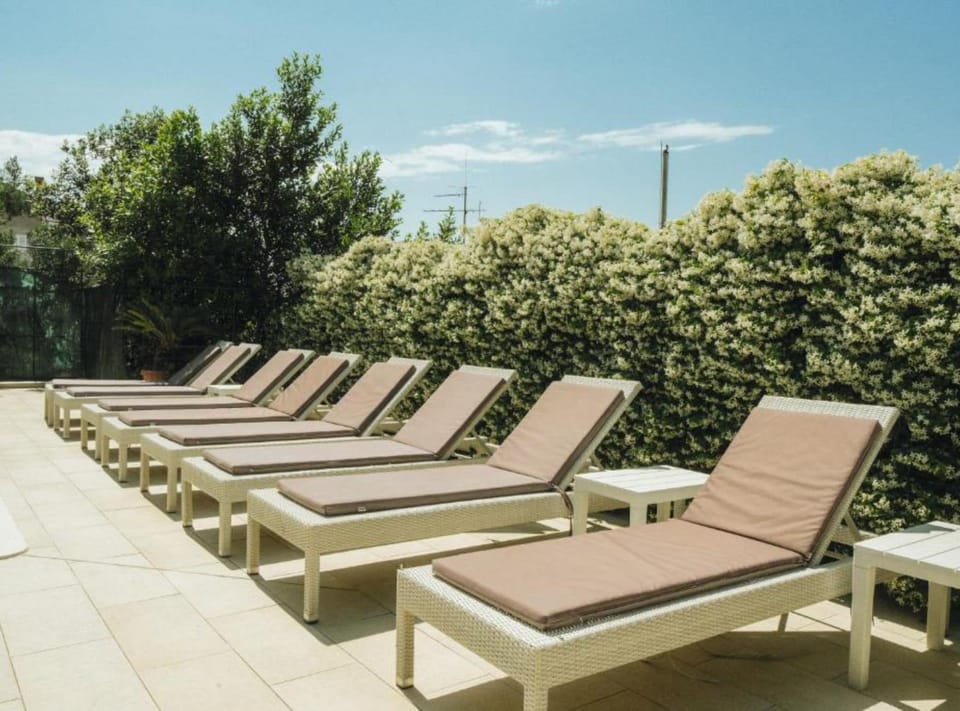 Apartment (Two Bedroom Apartment with Sea View a) | Outdoor pool | Seasonal outdoor pool, pool umbrellas, sun loungers