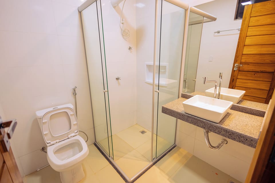 Shower, towels, soap, toilet paper