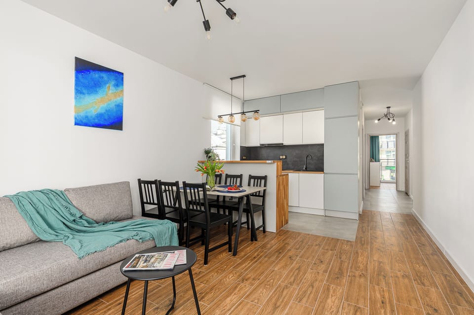 Family Apartment, Balcony, Courtyard View | Living area | Flat-screen TV
