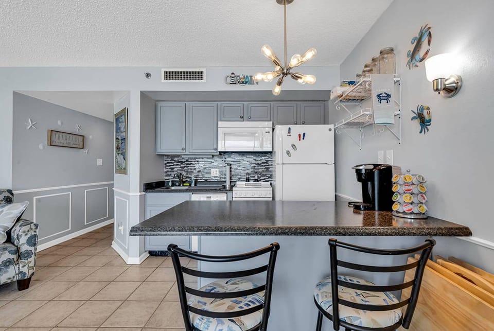 Signature Condo, 1 Bedroom, Ocean View, Oceanfront | Private kitchen | Fridge, microwave, oven, stovetop