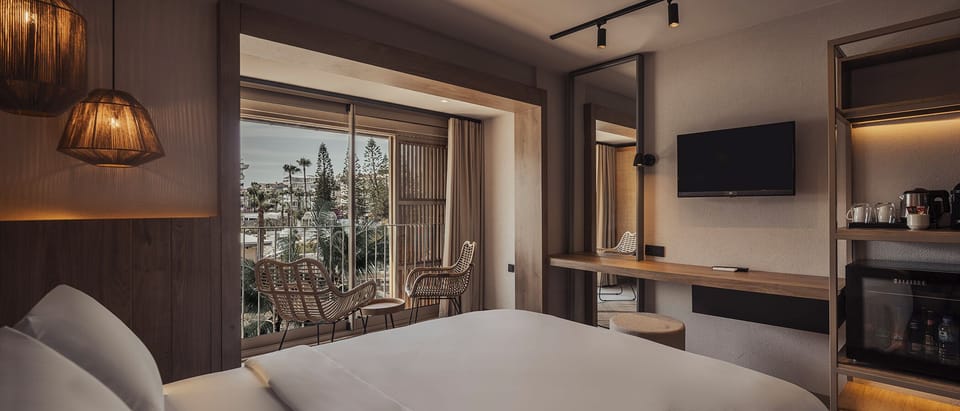 Room, Partial Sea View, Main Building | Minibar, individually decorated, individually furnished, desk