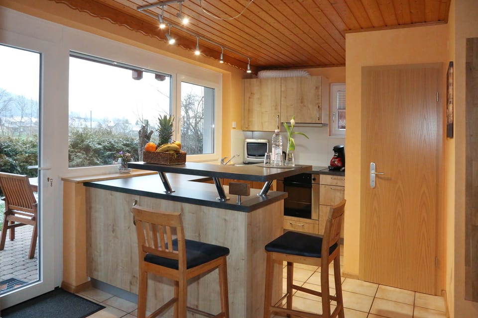 Apartment, 2 Bedrooms, Patio | Private kitchen | Full-size fridge, microwave, oven, stovetop